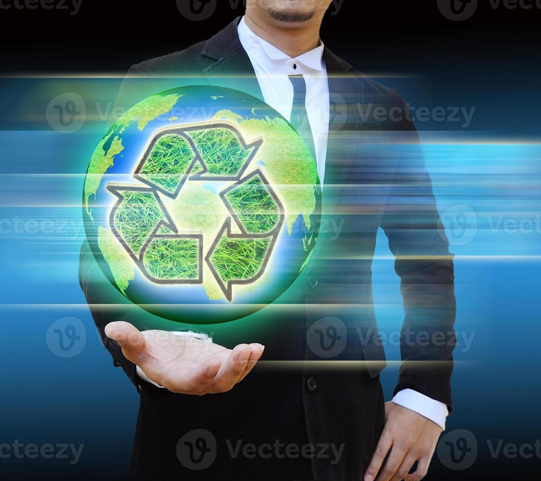 businessman holding world Recycle photo