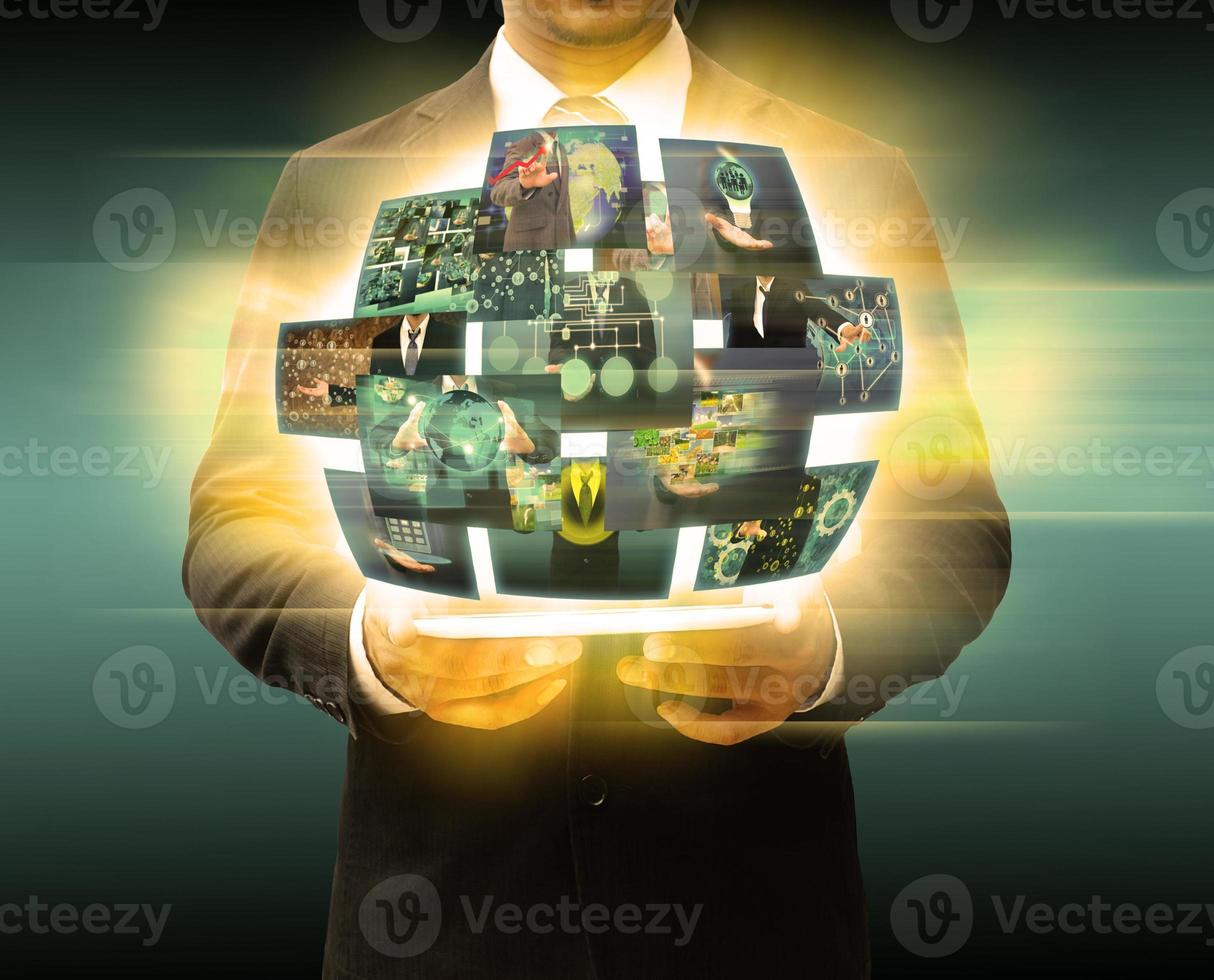 businessman holding tablet world technology and social media photo