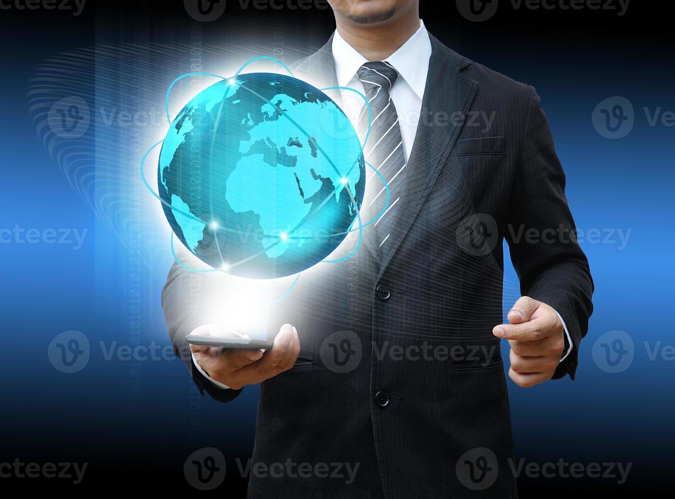 businessman holding smartphone world technology and social media photo