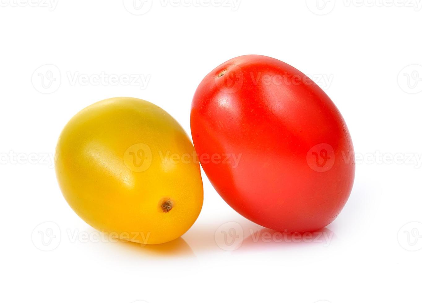 red and yellow cherry tomatoes isolated on white background. photo