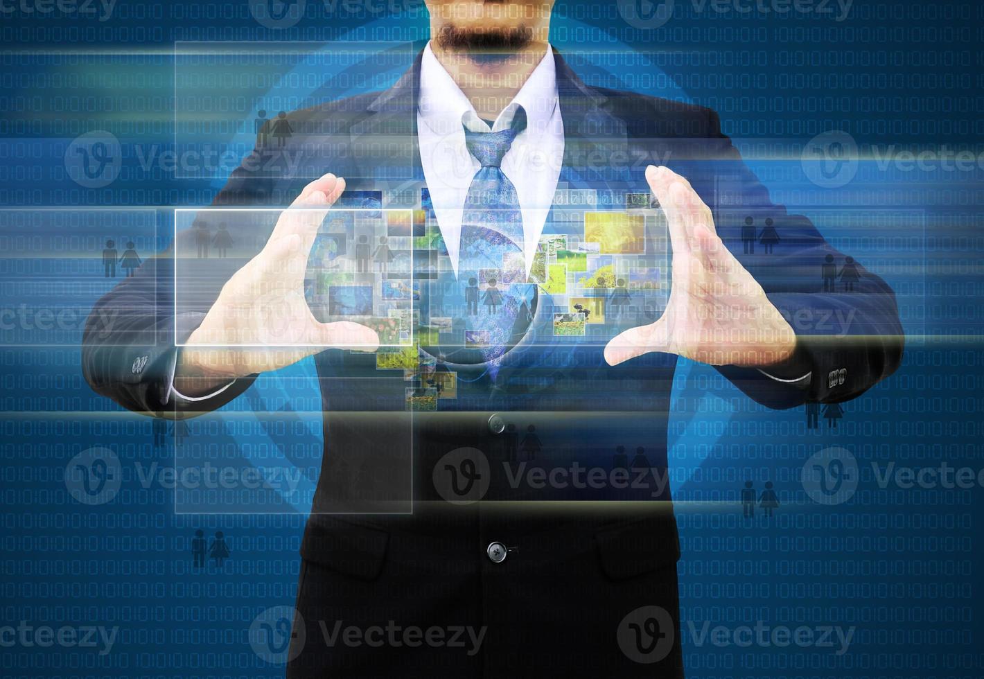 businessman holding social network photo