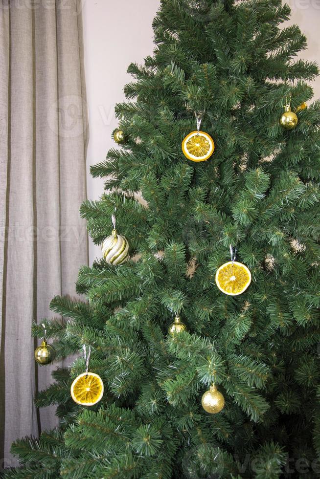 Christmas tree. Orange Christmas tree decorations for Christmas. photo