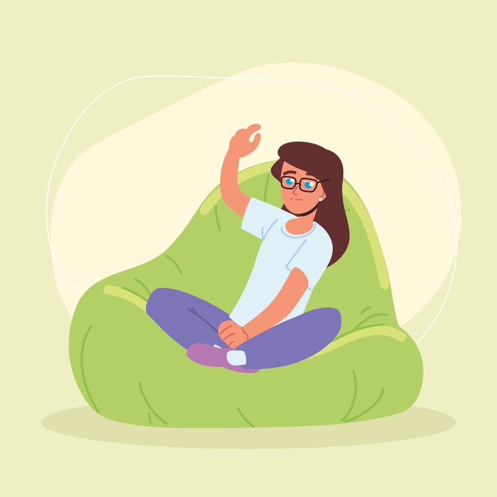 girl sitting in bean bag chair vector