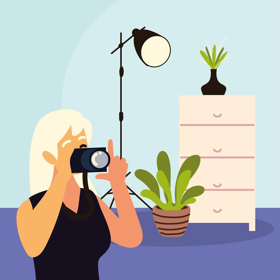 female photographer using camera vector