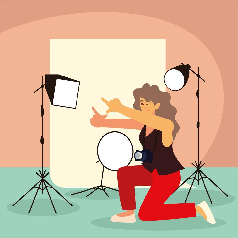 female photographer in studio vector