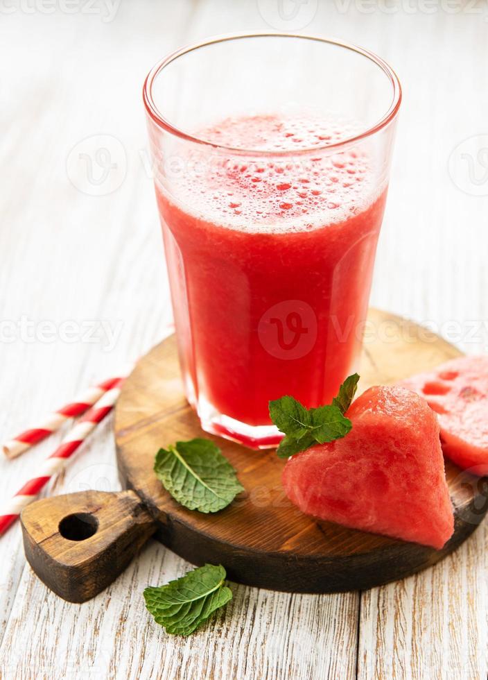 Watermelon smoothie and fresh watermelon photo