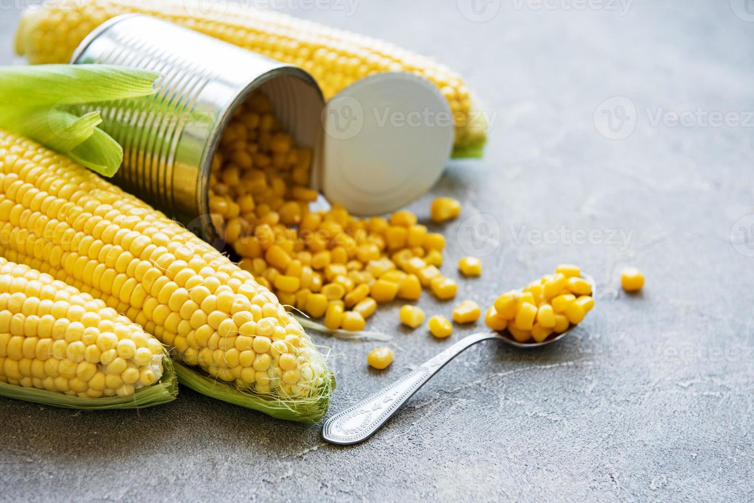 Preserves sweetcorn and raw corn photo