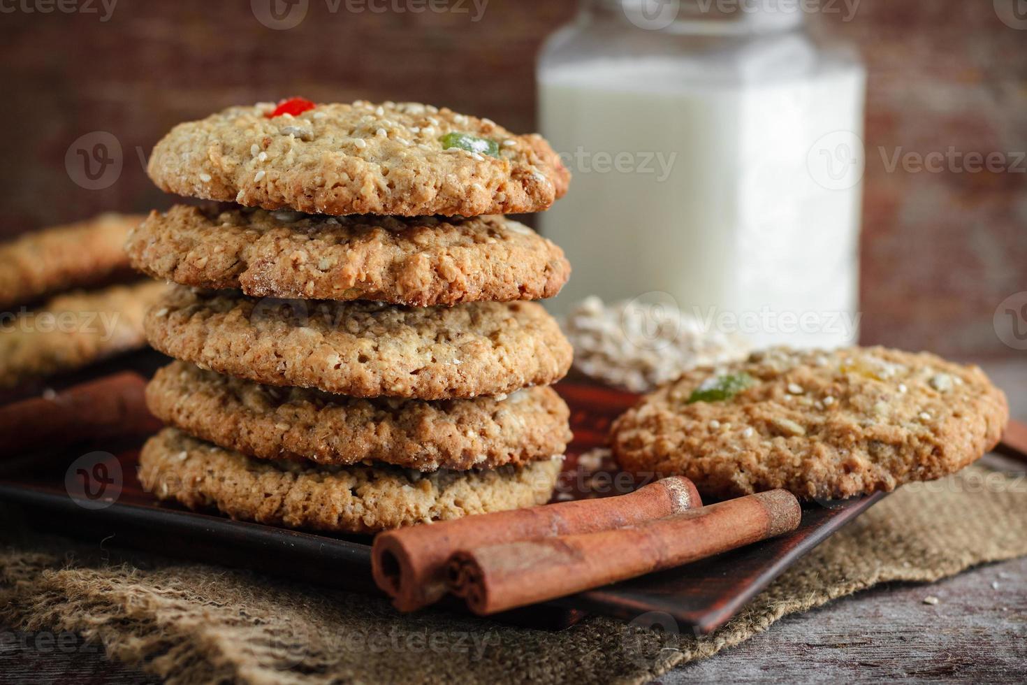 Oat biscuits on a wooden background photo