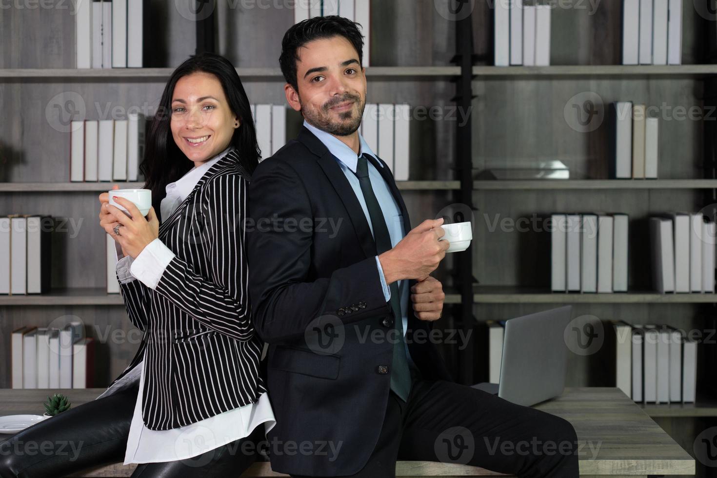 young caucasian businesswoman discuss with colleagues about profit of corporate in office. business concept photo