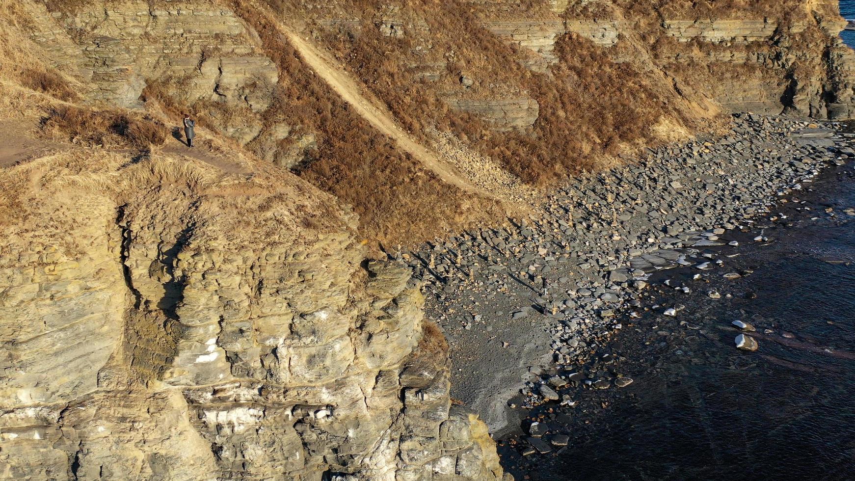 Aerial view of the seascape overlooking the rocks. photo