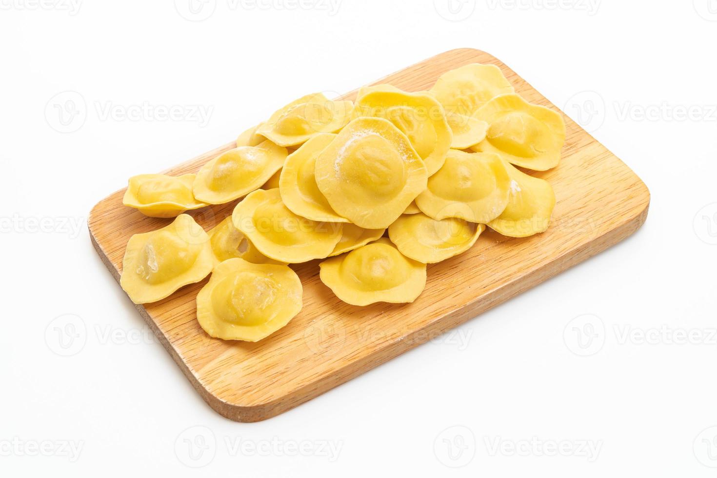 Traditional Italian ravioli pasta on white background photo