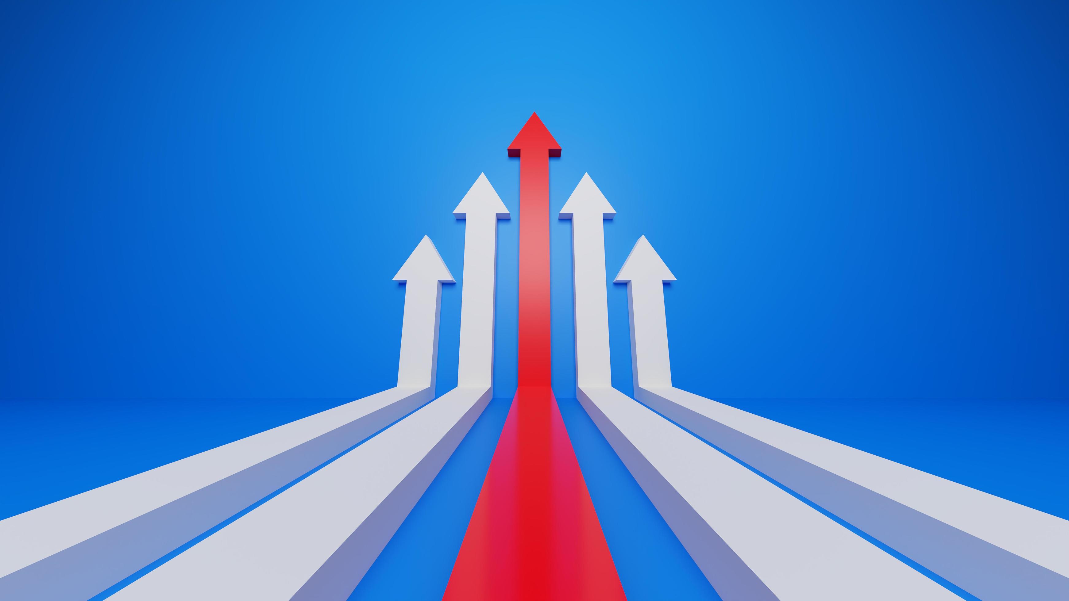 Leader Red arrow leading white arrow on blue background. Teamwork