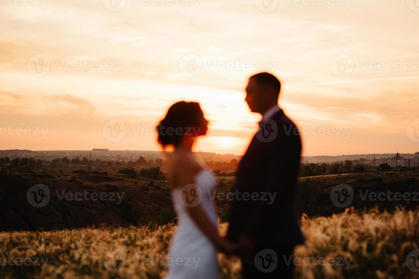 A couple in love a guy and a girl on a walk in the forest belt photo