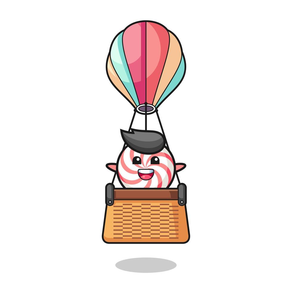 swirl lollipop mascot riding a hot air balloon vector