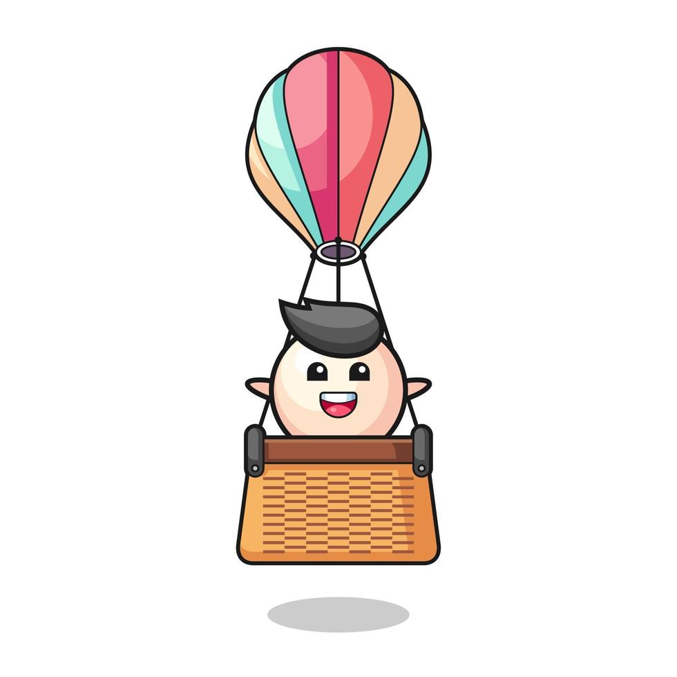 pearl mascot riding a hot air balloon vector