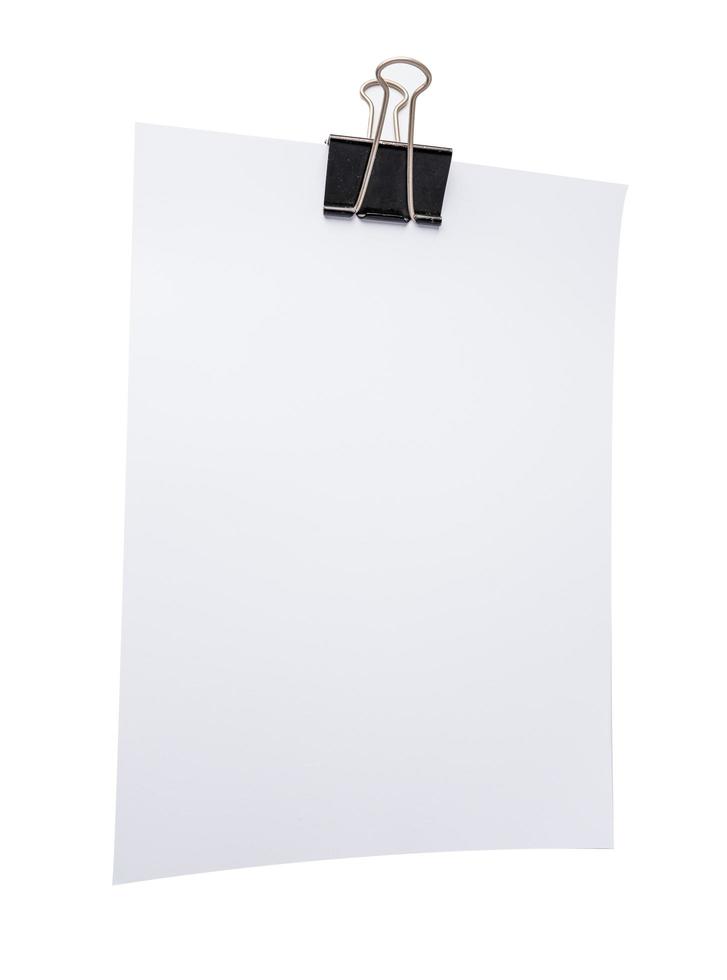 White note paper with paperclip on white background. photo