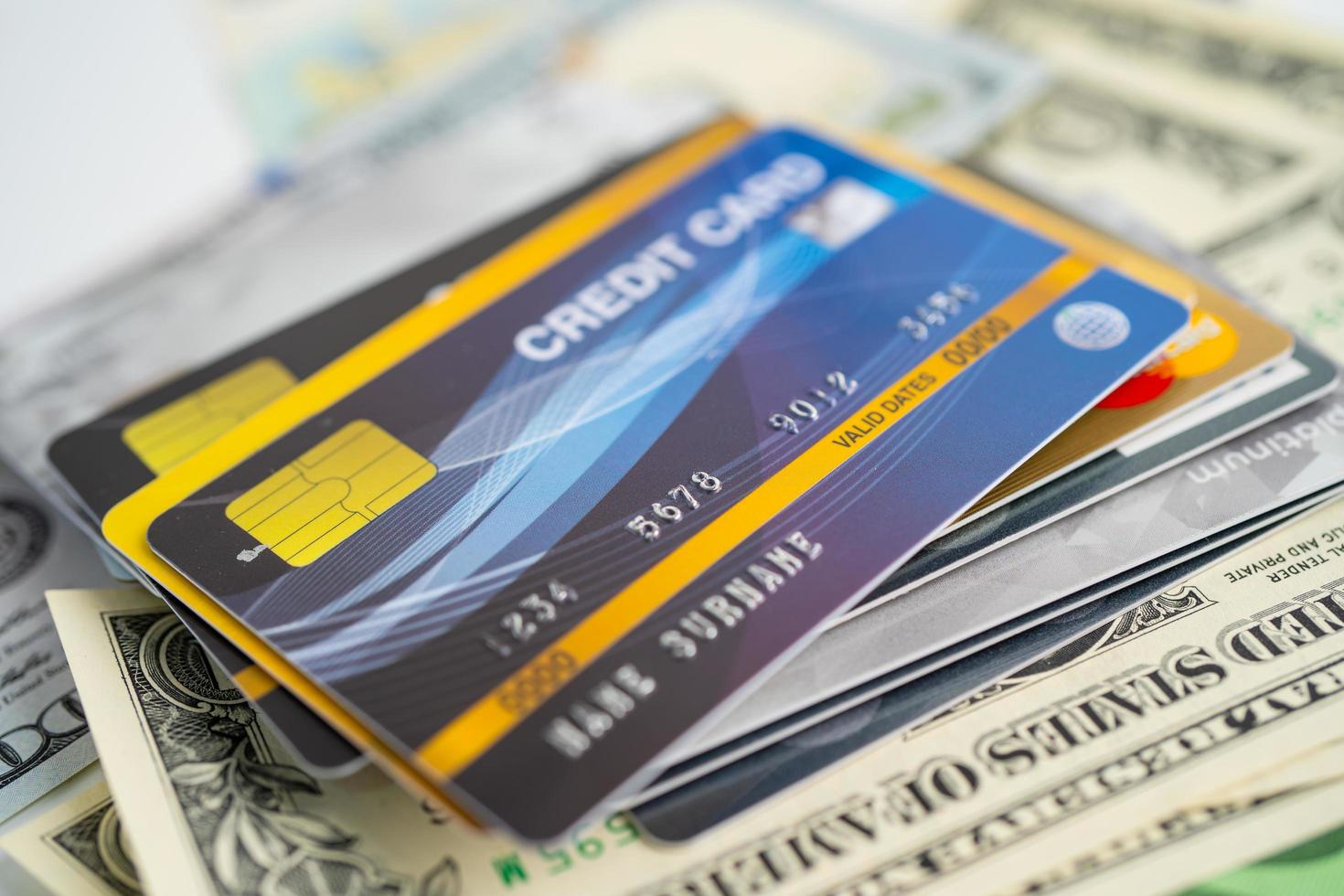 Credit card on US dollar banknotes. Finance development, Banking Account, Statistics, Investment Analytic research data economy, Stock exchange trading, Business company concept. photo