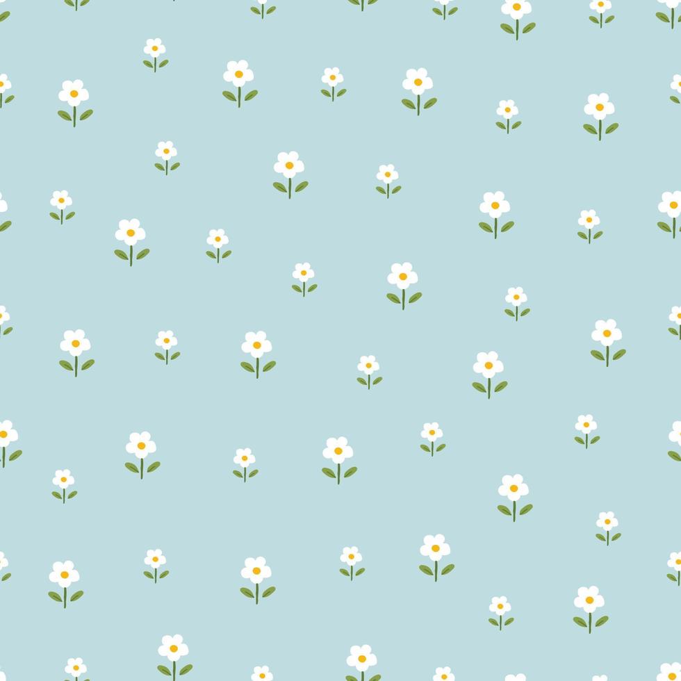 Seamless pattern small flower background randomly placed on blue background hand drawn design in cartoon style Used for prints, wallpapers, fabrics, textiles Vector illustration.