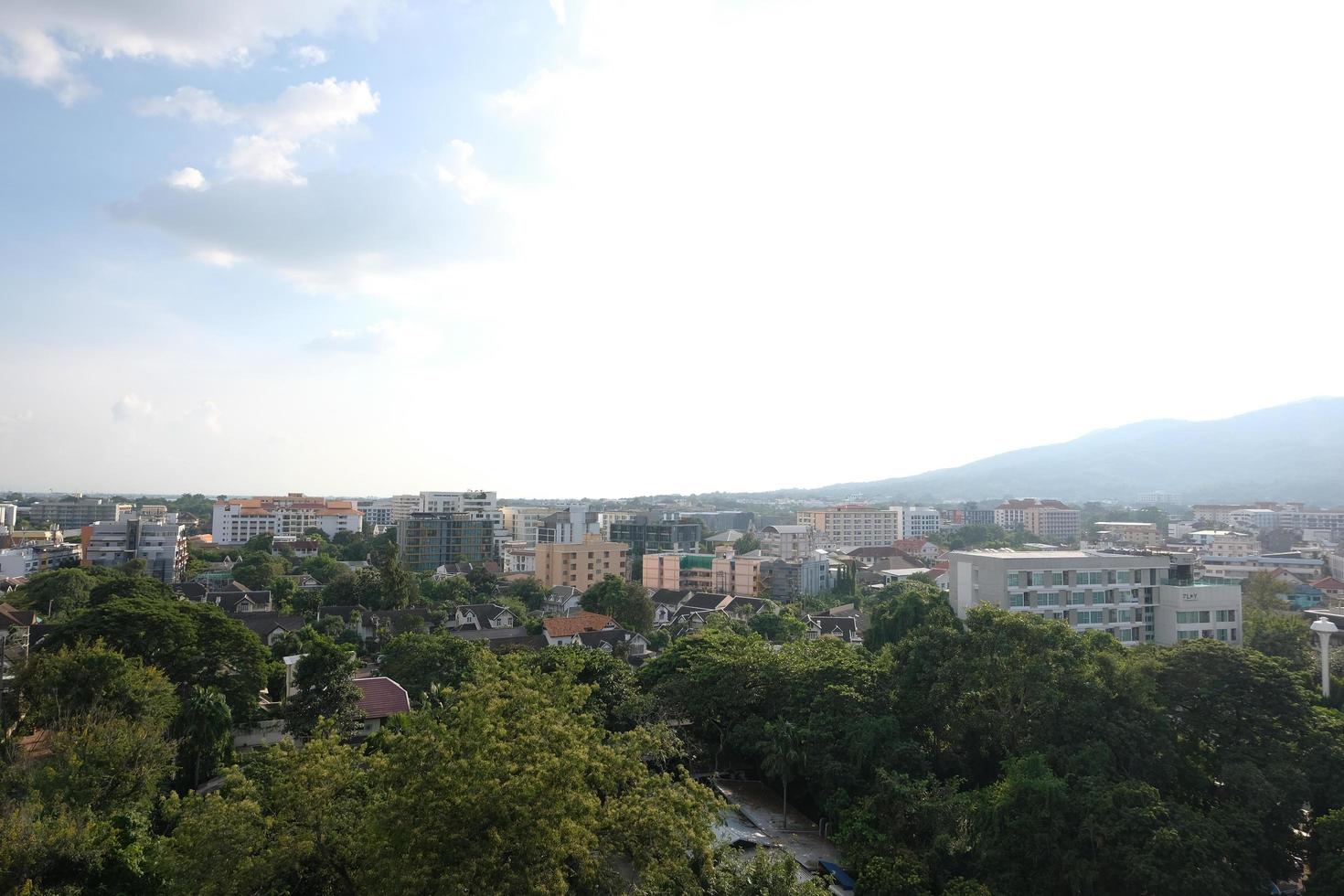 Aerial view of a magnificent metropolis in Chiang Mai, Thailand, Asia, with a mountain perspective. photo