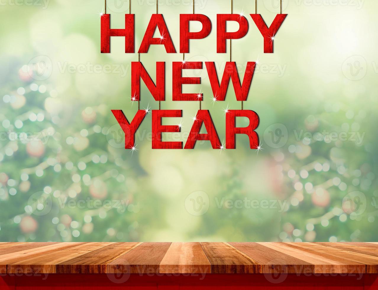 Happy new year red wood word hanging over marble table photo