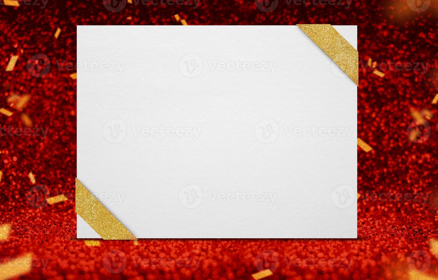 Blank poster with ribbon at perspective red sparkling glitter with gold confetti photo