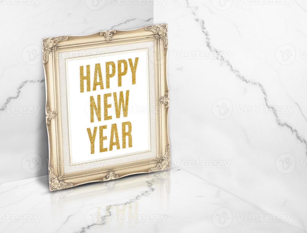 Happy new year word on vintage golden photo frame at white glossy marble corner studio room background