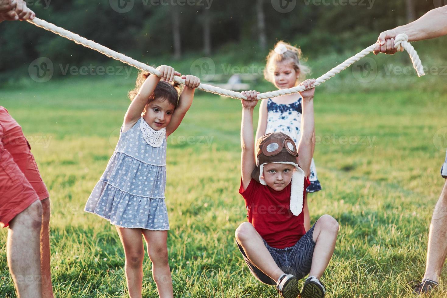 What a ride. Pulling a rope game going so fun. Thats was is looks like to have good parents who like nature and action photo