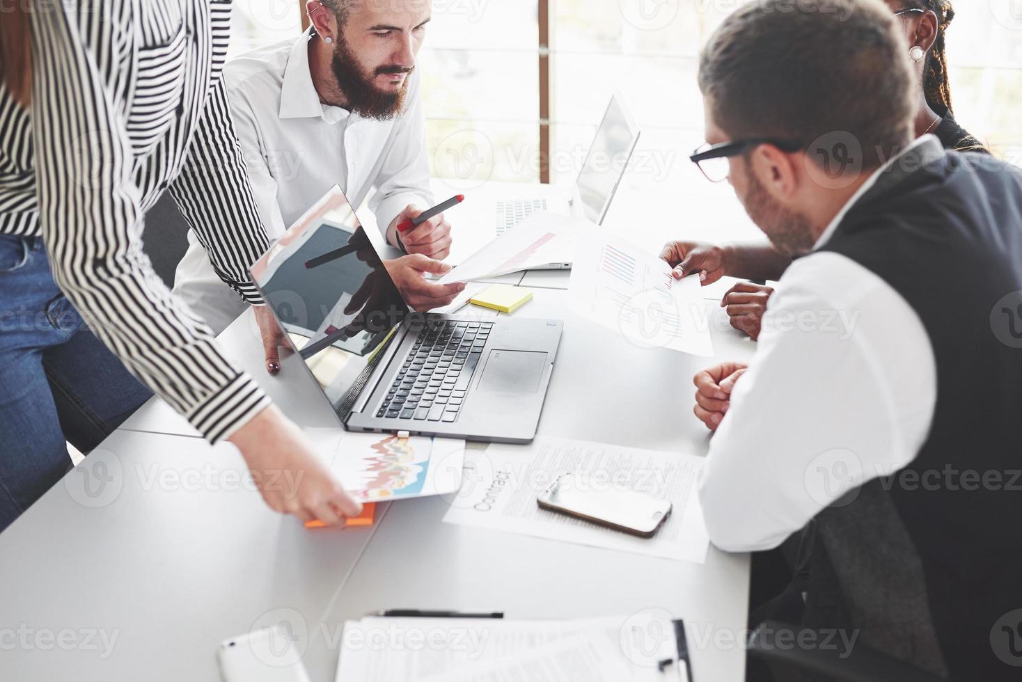 Sharing ideas. Team workers have meeting and talking about planning their business photo