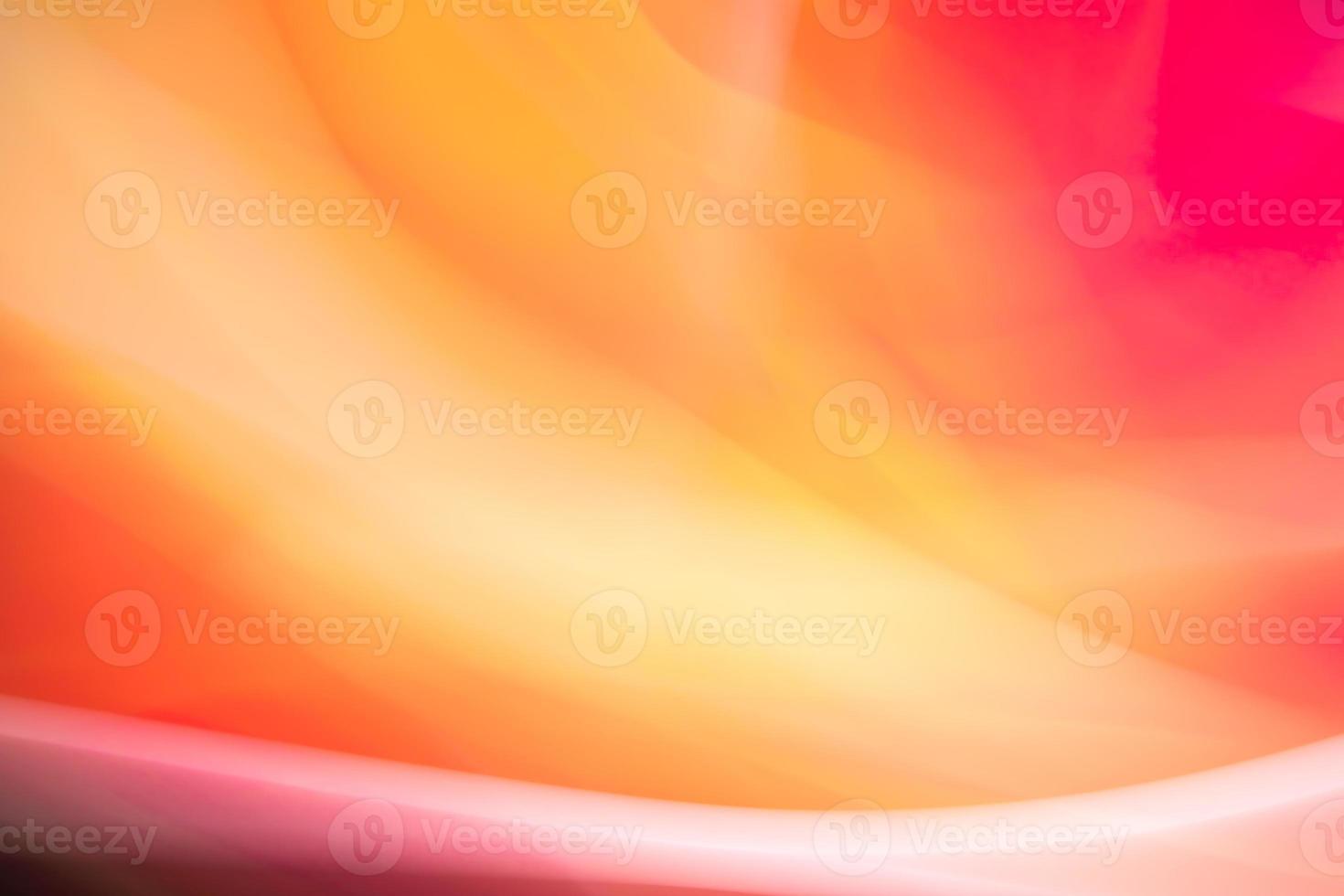 Abstract background of waves in red tones. Backdrop for web design, packaging, advertising. photo