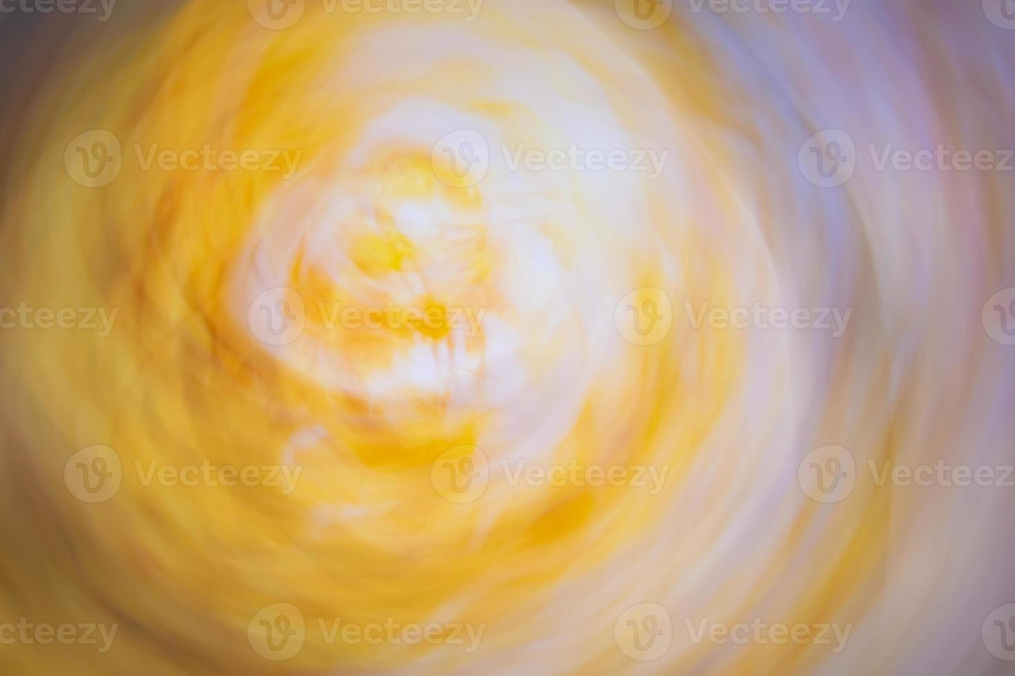 Abstract twisted background in yellow, beige, lilac, gray colors. photo