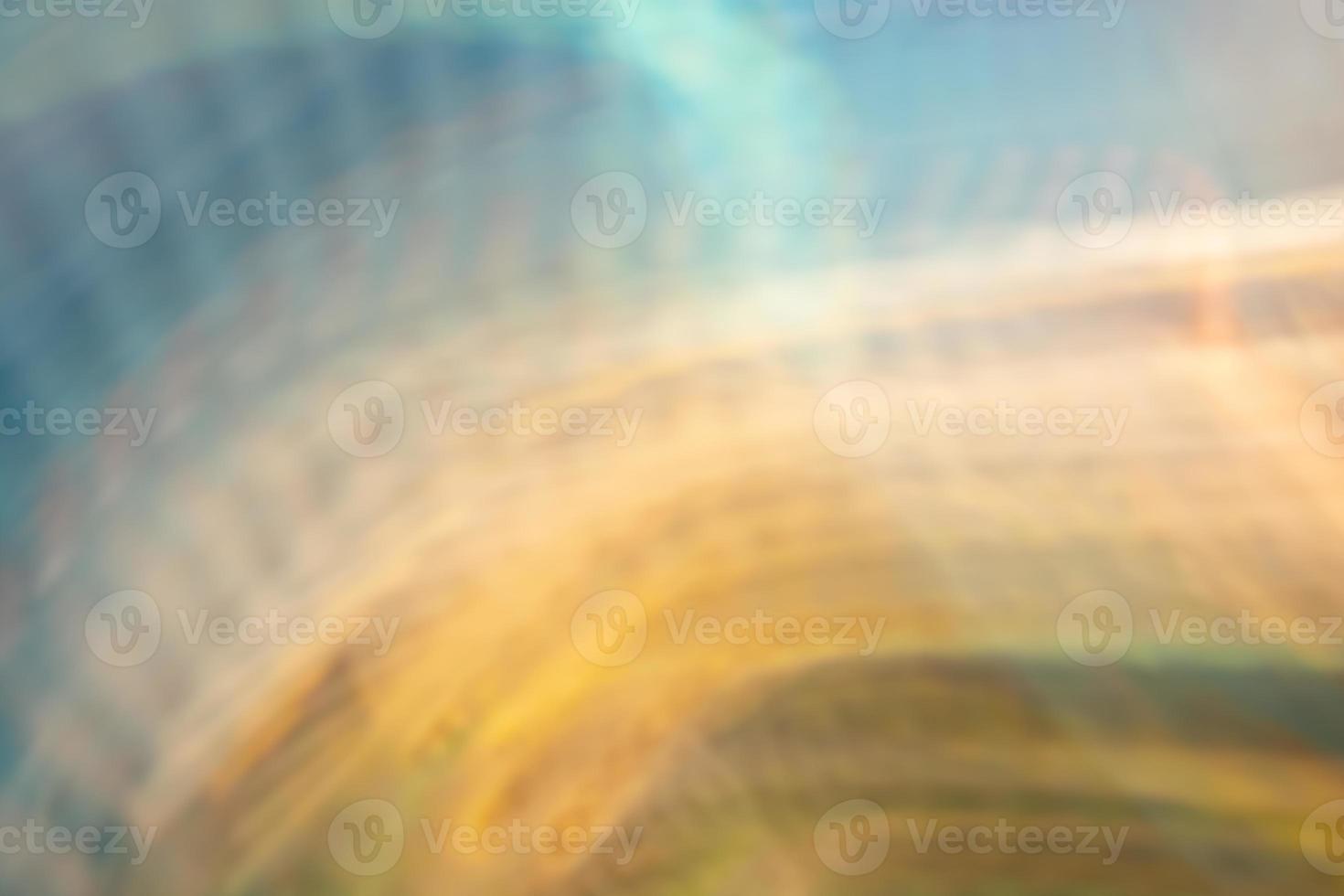 Multicolored abstract background of wavy lines and small waves in turquoise, yellow, brown tones. photo