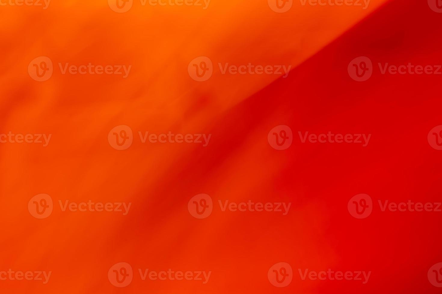 Bright red-orange background. photo