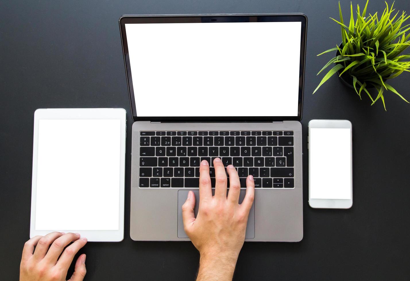 hands touching responsive web design devices photo