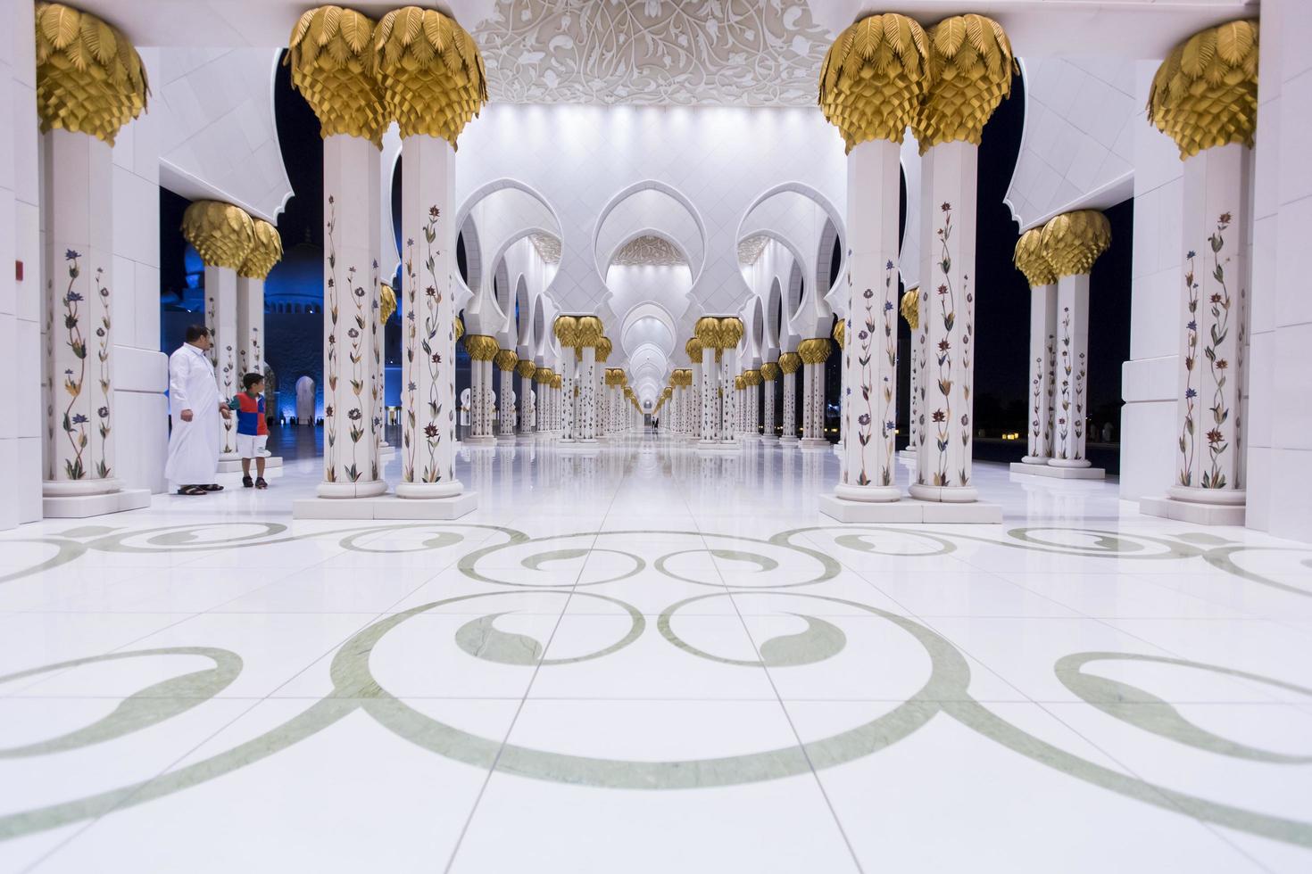 ABU DHABI, UAE, MAY 4, 2015 - Interior of Sheikh Zayed Mosque in Abu Dhabi. Mosque was designed by Yusef Abdelki and opened at 2007. photo