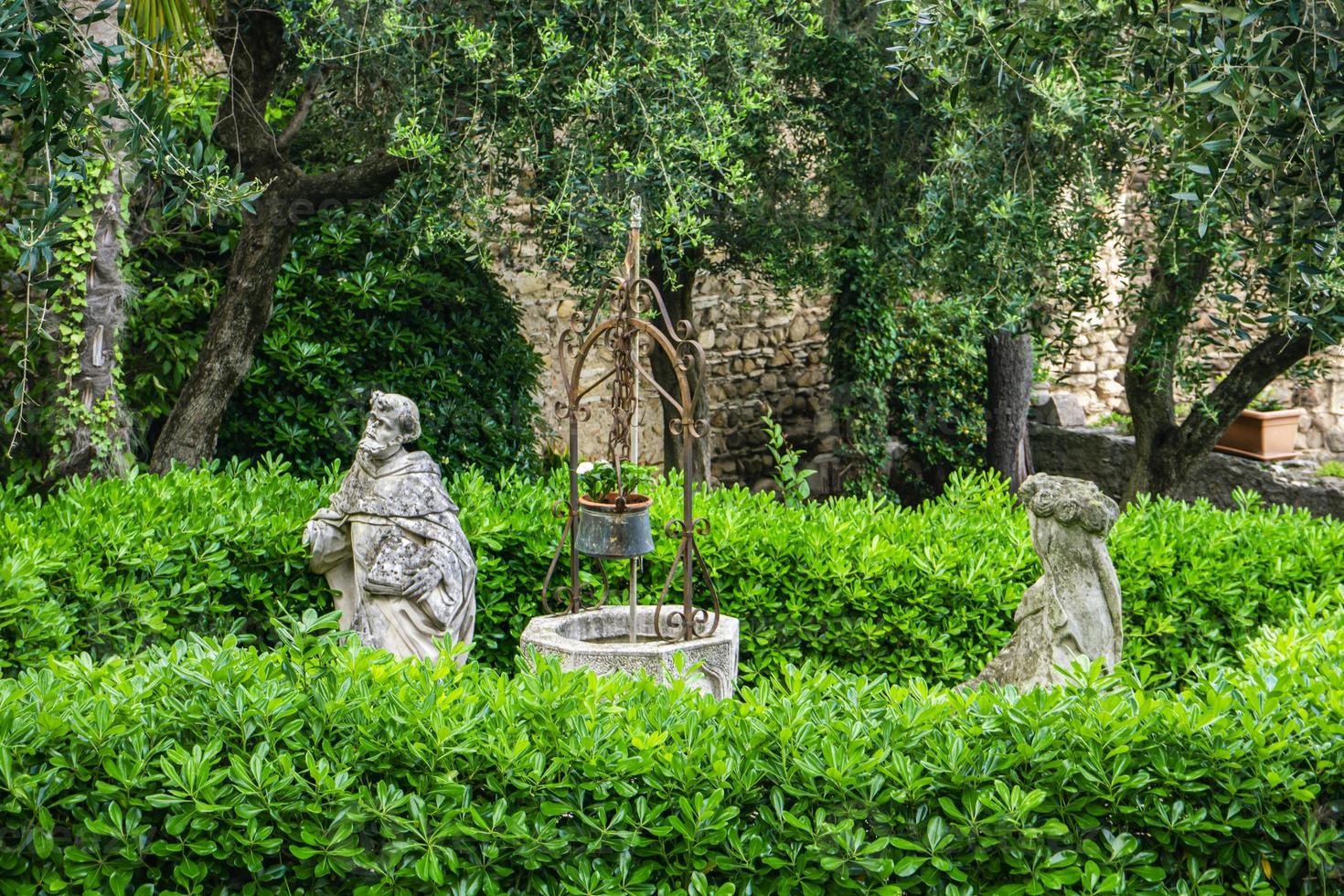 Beautiful garden in Sirmione, small town on the shores of Lake Garda in Lombardy, Italy photo