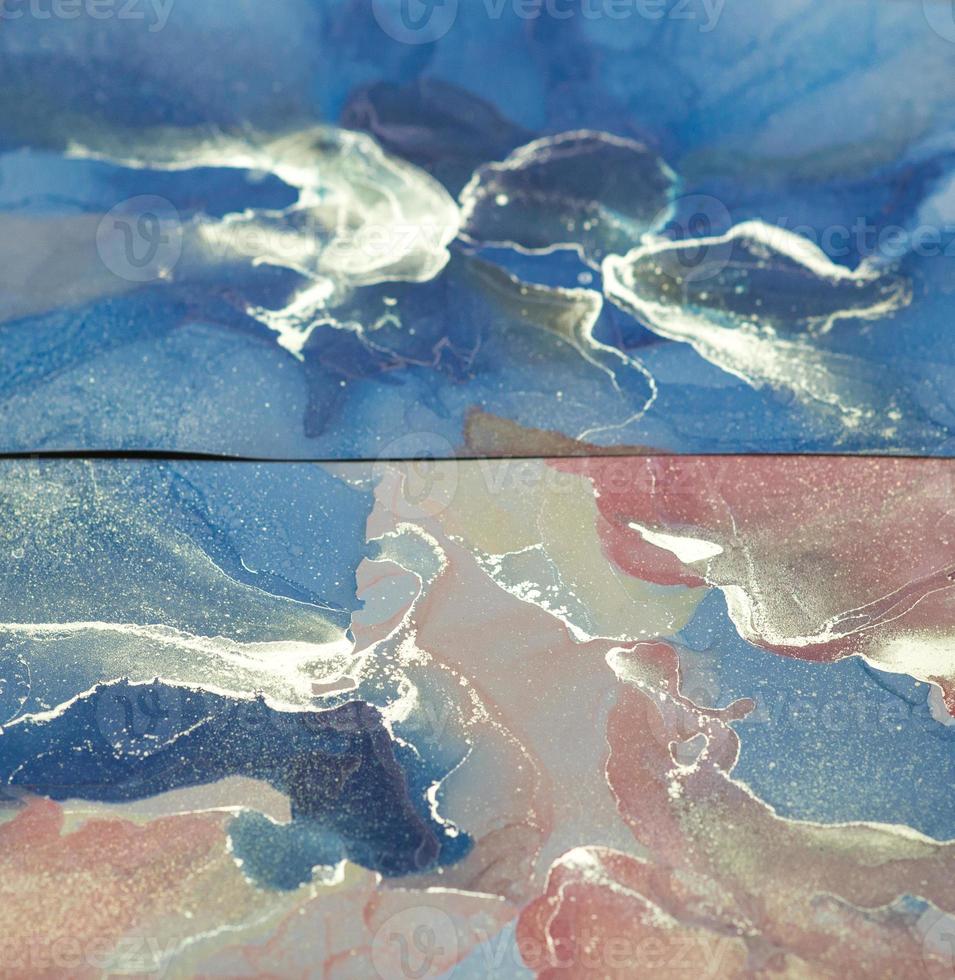 Abstract blue and silver background, wallpaper. Mixing acrylic paints. Modern art. Alcohol ink colors translucent. Alcohol Abstract contemporary art fluid. photo