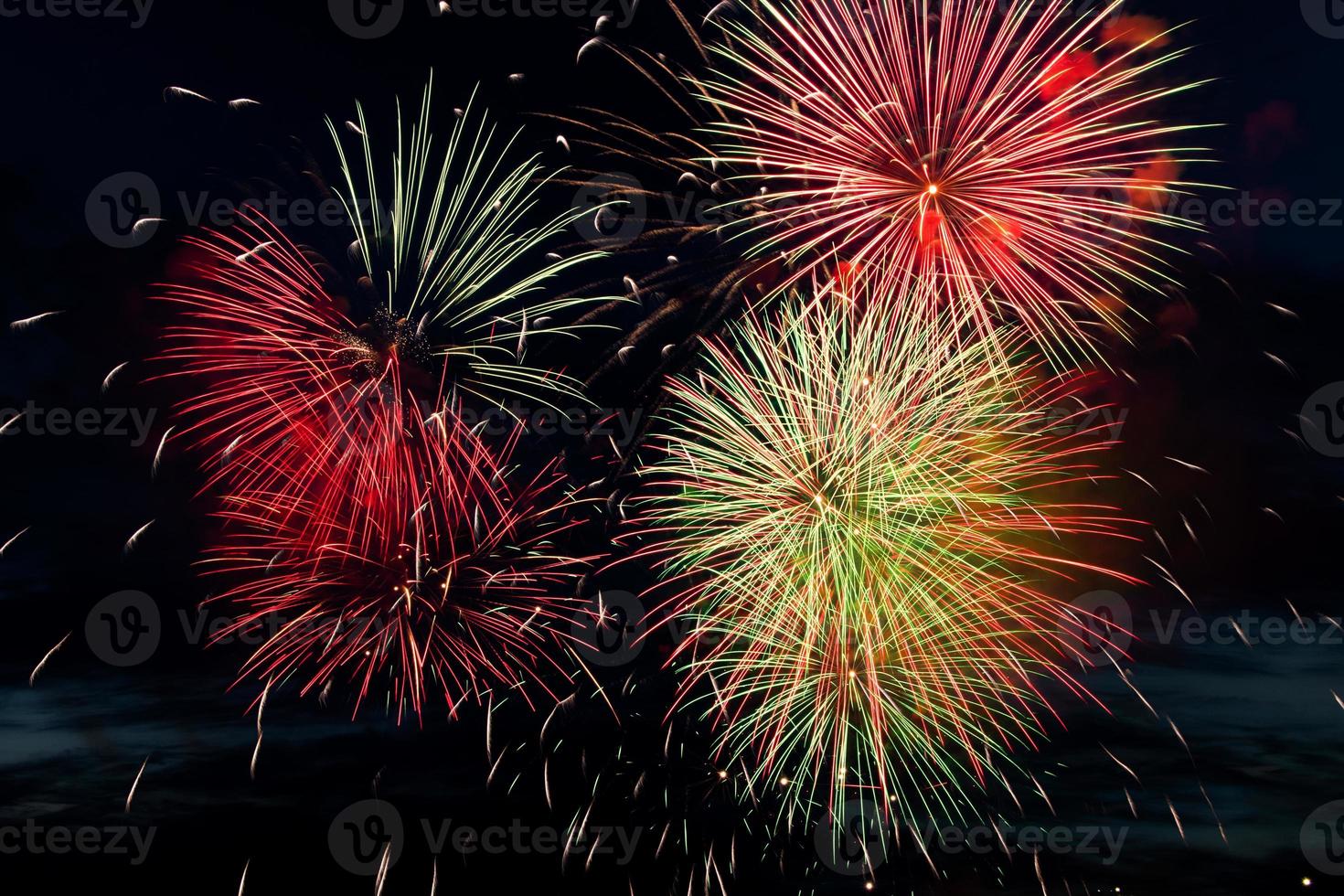 Bright colored fireworks on black background. photo