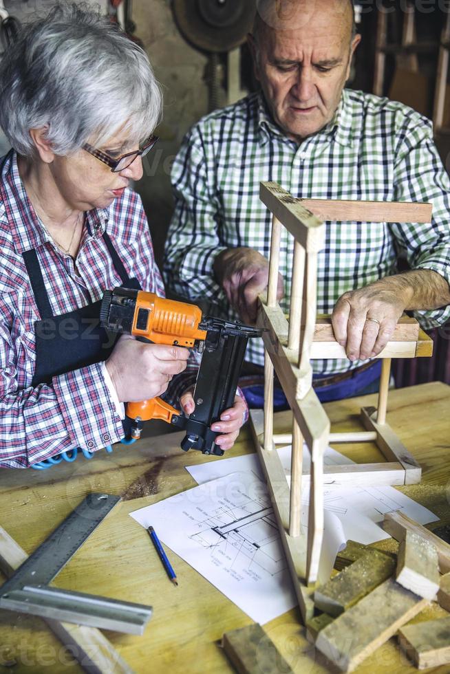 Senior couple in a carpentry photo