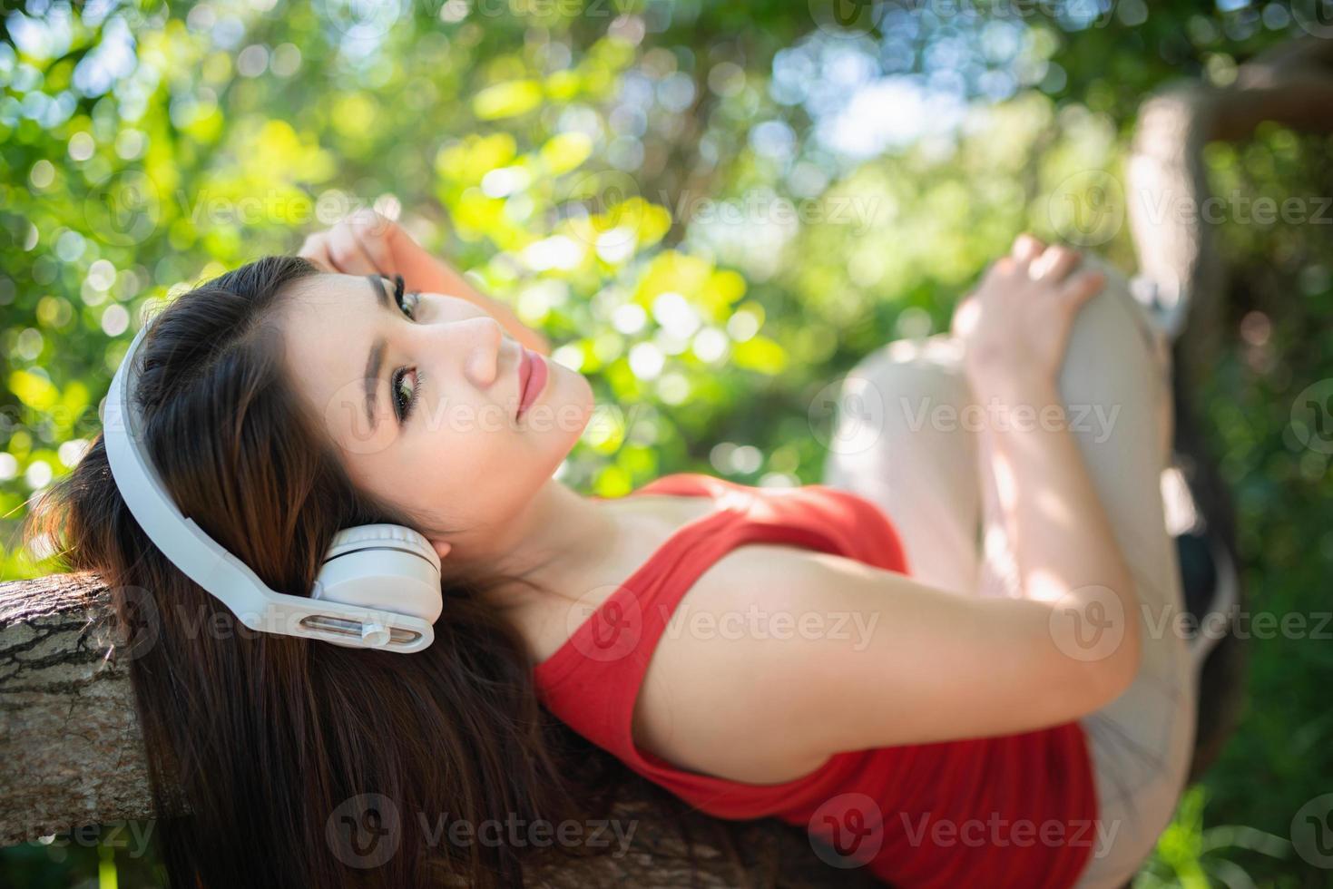 Beautiful young woman with headphones photo