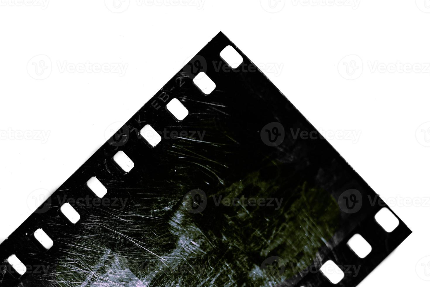 Detail of photographic film for slides on white background photo