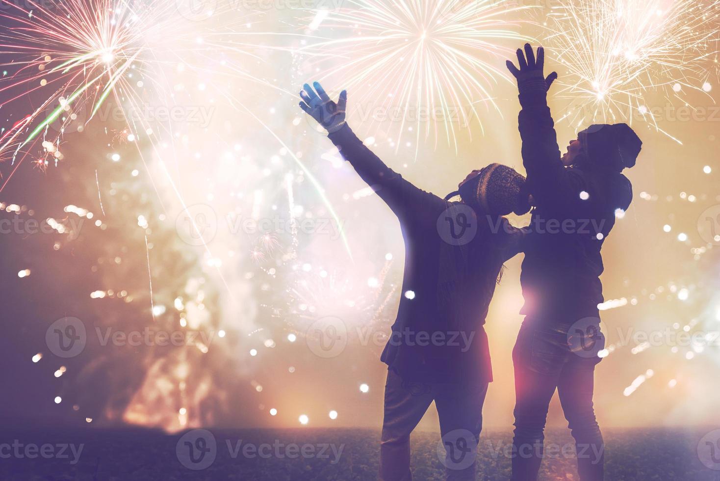 Lover women and men asians.Stand watch the fireworks photo