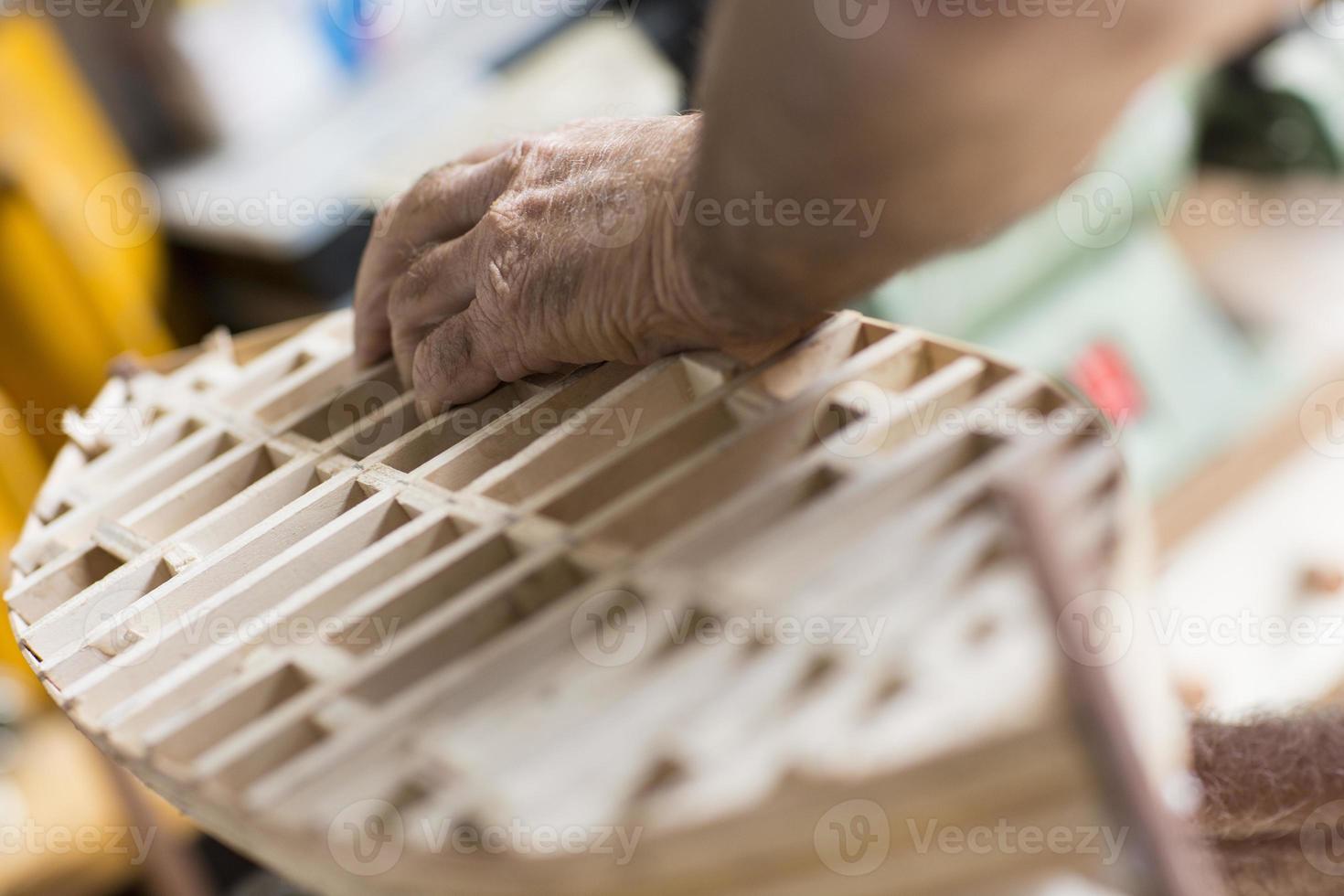 handcrafted craftwork of a wooden boat model photo