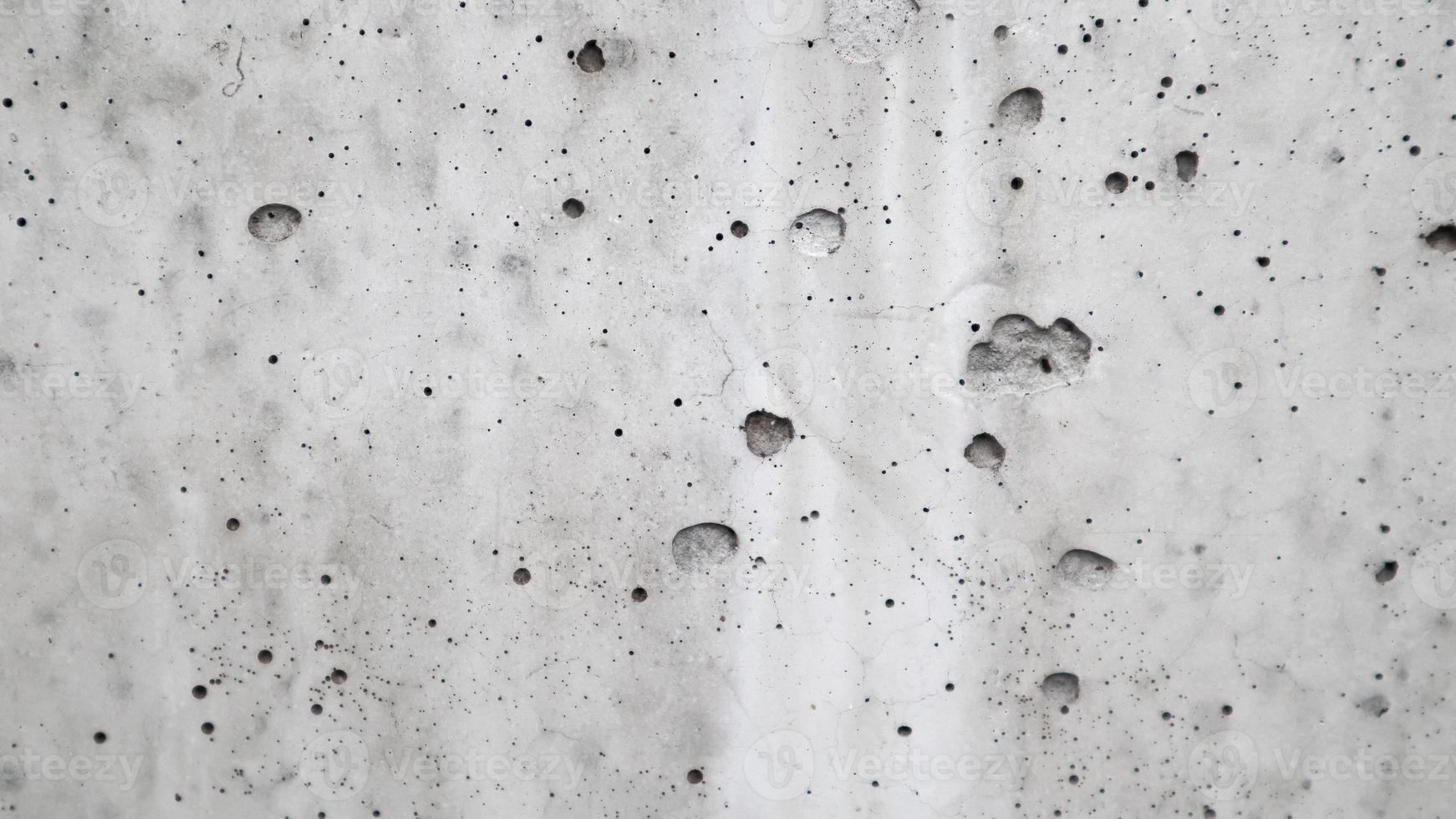 textura de muro de hormigón gris. la textura de la vieja superficie blanca para el fondo foto