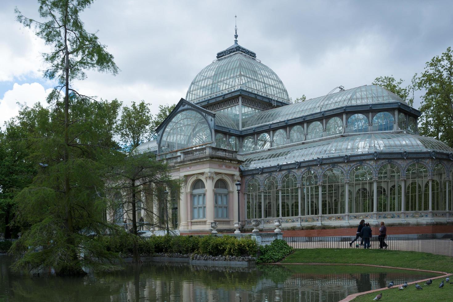 Crystal Palace at Retiro park, Madrid, on a cloudy day photo