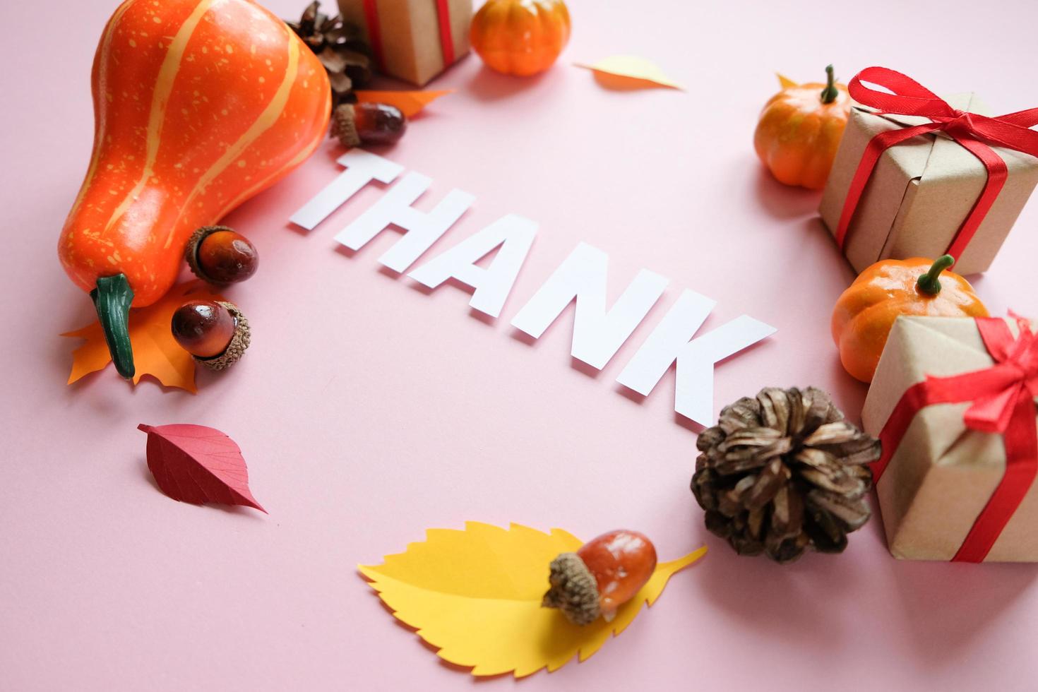 Thanksgiving day. Lettering thank with autumn elements. Thanksgiving concept, greeting card. photo