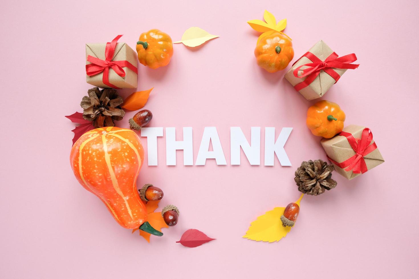 Thanksgiving day. Lettering thank with autumn elements. Thanksgiving concept, greeting card. photo