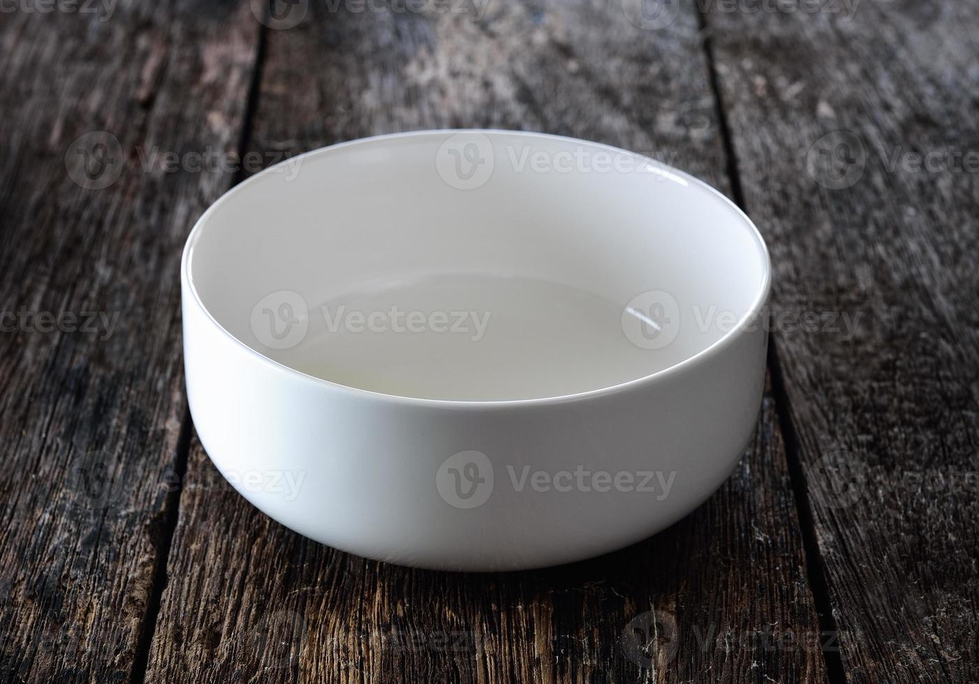 empty bowl on wood photo