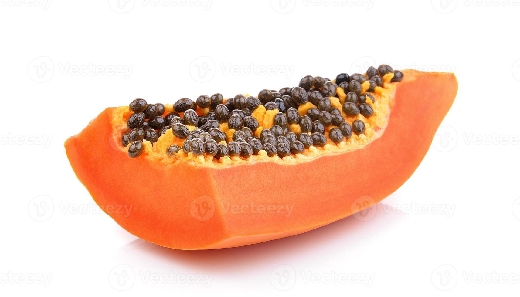 papaya slice on white background photo