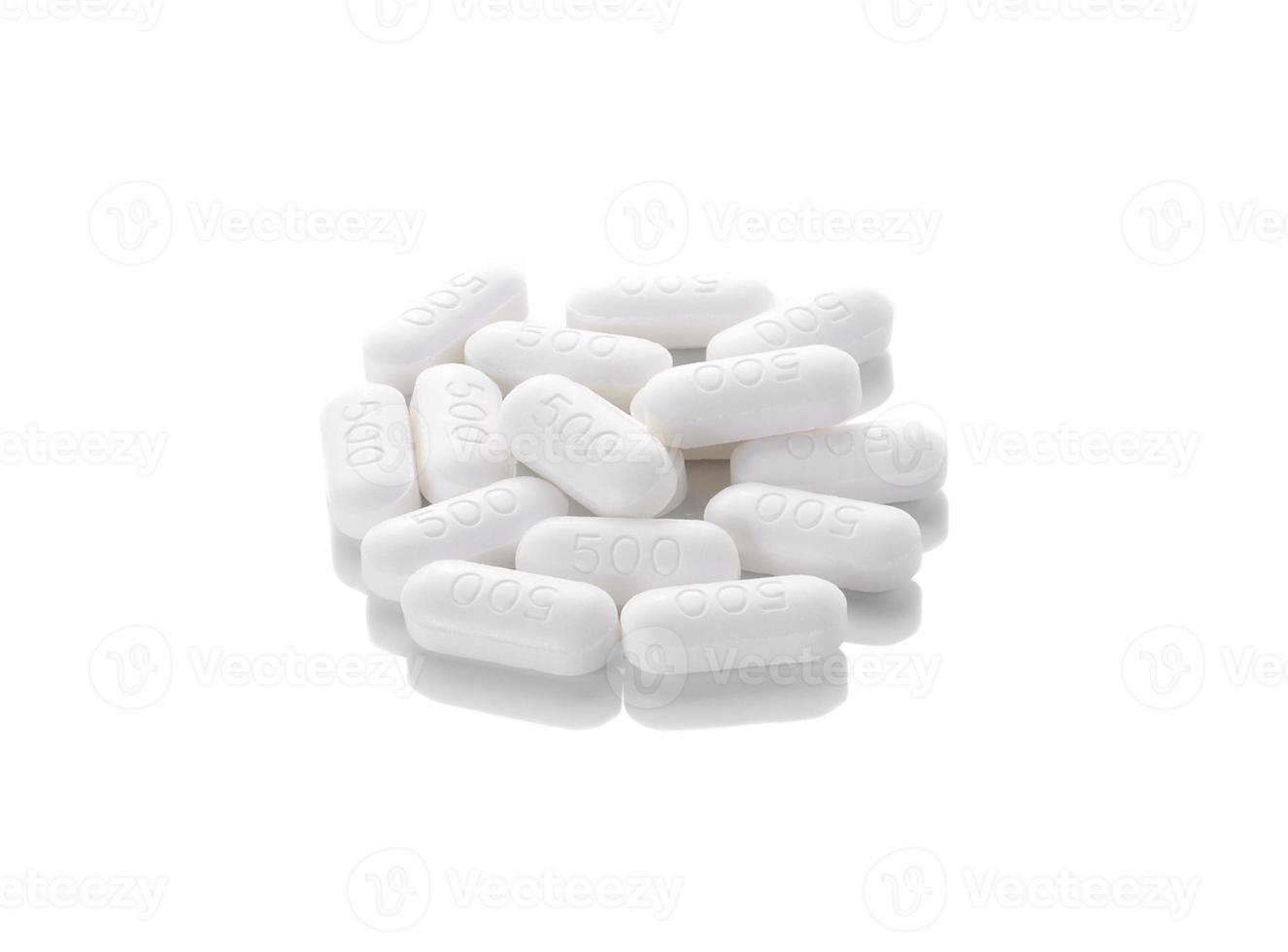 píldora sobre fondo blanco foto