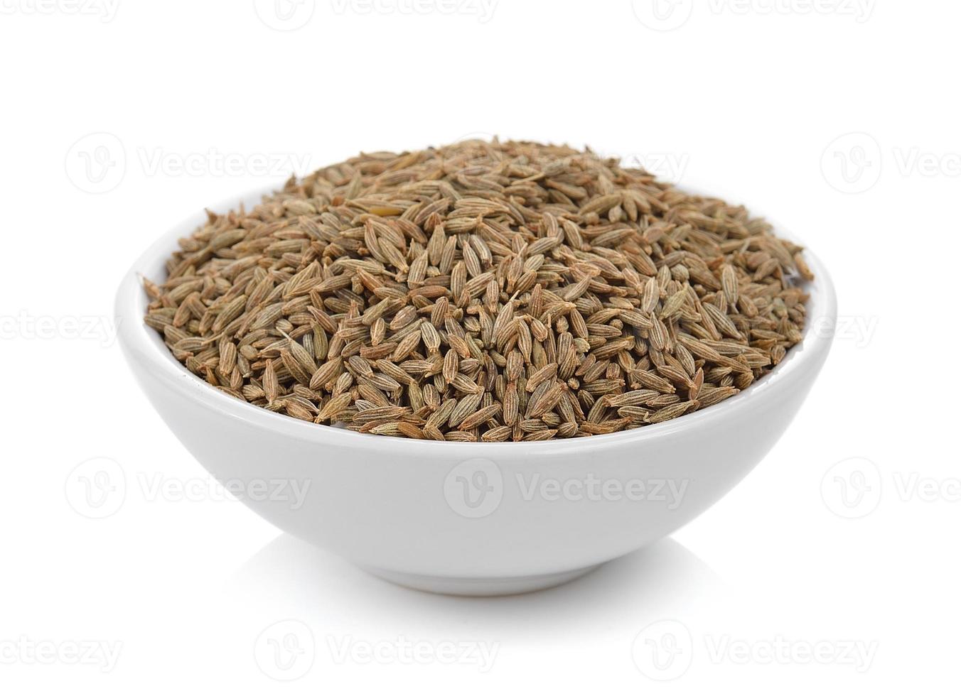 caraway thai herbs spices in the bowl on a white background photo